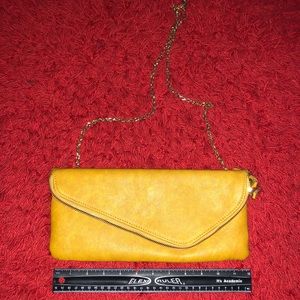 Mustard clutch w/ gold chain